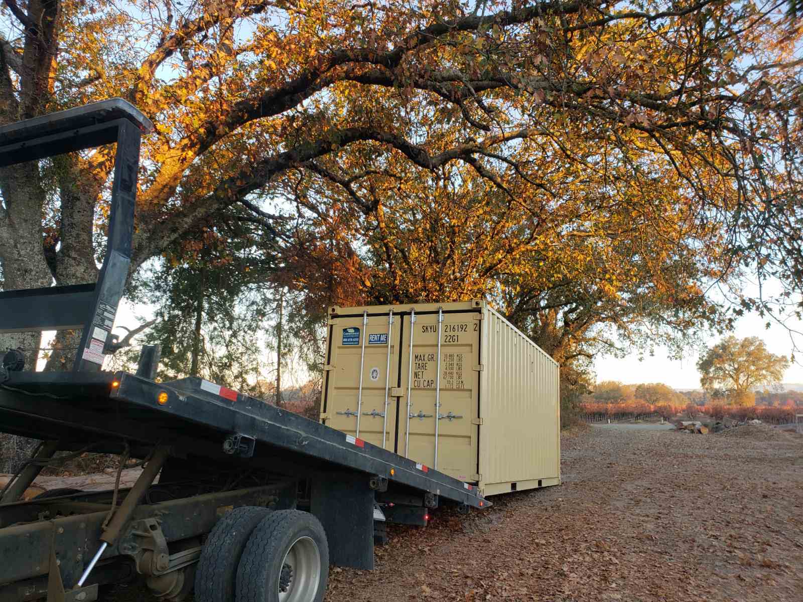 tow truck slide off shipping container delivery